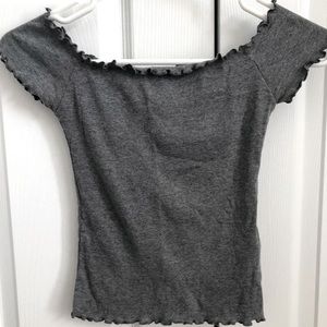 Off the shoulder lettuce hem shirt